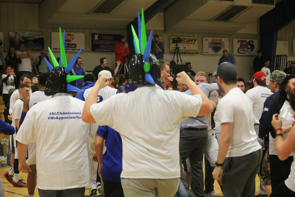ALC's Caney Crazies celebrating after the game